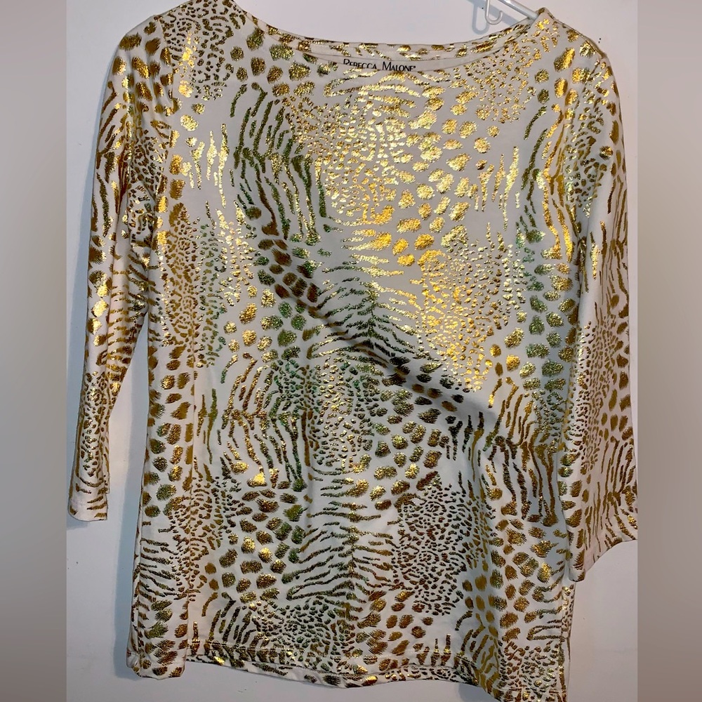 Rebecca Malone gold shirt